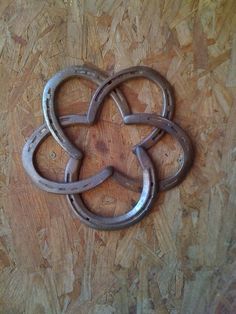 an odd shaped object sitting on top of a wooden floor