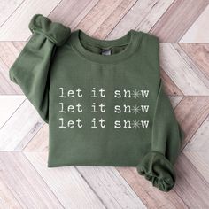 The Let it Snow, Let it Snow, Let it Snow cozy crewneck sweatshirt is perfect for the holiday season or a snow day!  I love working with custom orders!  If you have a design in mind, or have something customized already and would like it on a shirt, send me a message and we can make that happen! This item is printed with ink through a partnership with a print company.  It's not one of the hand-painted items in this shop.  Therefore, I have not personally inspected it before it's shipped, or pack Christmas Sweatshirt Ideas, Vintage Christmas Shirt, Cute Christmas Sweater, Sweatshirt Aesthetic, Coffee Sweatshirt, Adventure Shirt, Winter Shirts, Travel Shirts, Candy Canes