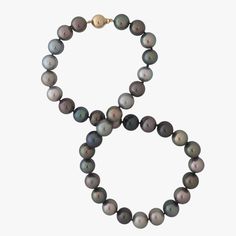 This genuine Tahitian pearl necklace is truly exceptional, with its high-quality pearls and luxurious 14K yellow gold ball clasp. The pearls are cultured Tahitian pearls, displaying a captivating range of colors from green, blue, bronze, and silver to pistachio, each with its unique rich overtones. Their size, high luster, and round or near-round shape, coupled with very very subtle natural inclusions, further testify to their authenticity and quality. The pearls are excellently matched in size, Tahitian Pearl Necklace, Color Mix, Tahitian Pearls, Cultured Pearls, Pistachio, Round Shape, Pearl Necklace, Color Mixing, Yellow Gold