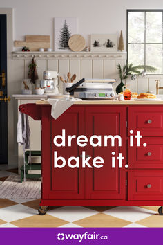 a red kitchen island with the words dream it bake it