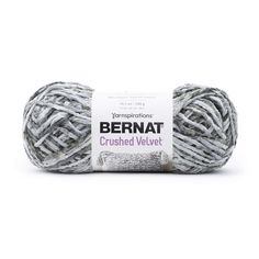 yarn ball in grey and white with the words bernat crushed velvet written on it