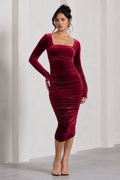 Crafted in a premium stretch velvet to fit like a glove, this form-fitting midi was designed to see you through every occasion. Juliette arrives in a rich berry shade, detailed by a sculpting square neck and flattering full body ruching. Try styling this berry midi dress with gold accents for the perfect dinner date ensemble. Features- Premium stretch velvet- Bodycon fit- Fully ruched- Square neckline- Long sleeves- Midi lengthSizing & FitModel is 5'8" and wears US size 4 / UK size 8Product InformationDesigned exclusively by Club L LondonFully lined with good stretchPremium velvet in Berry (95% Polyester, 5% Elastane)100cm total lengthSKU: CL129764064 Midi Bridesmaid Dress, Velvet Prom Dress, Sleek Bun, Perfect Dinner, Velvet Midi Dress, Black Tie Gala, Sophisticated Dress, Bodycon Midi Dress, Dress With Long Sleeves