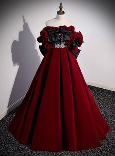 A symphony in deep crimson, reminding us of that vibrant friend who turns every gathering into a memorable event. We poured our passion into crafting this masterpiece, accentuating its charm with billowy ruffles that echo the whispers of classic elegance. Beneath the luxurious layers, a hint of delicate lace emerges, adding a touch of intrigue. And, for ease and convenience, a subtle zipper ensures you remain poised and graceful throughout. Prom Dress Off The Shoulder, Prom Dresses Off The Shoulder, Burgundy Background, A Line Evening Dress, Floor Length Prom Dresses, Sweetheart Prom Dress, Long Formal Dress, Burgundy Prom Dress, Prom Dresses For Sale