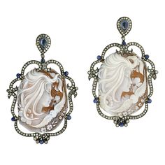 18Kt Gold:1.67g, Diamond:2.62Ct, Silver:18.66g, Blue Sapphire:3.05Ct, Cameo:55.3Ct Blue Sapphire Gemstone, Cameo Earrings, Designer Handmade Jewellery, Cameo Jewelry, Diamond Dangle Earrings, Blue Sapphire Diamond, Sapphire Earrings, Mens Jewelry Bracelet, Sapphire Gemstone