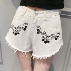 This is a simple printed shorts,it is very comfortable jeans fabric,clothes pants is very loose,plus beautiful tassel,you will feel cool in summer,simple pattern match clothes look very beautiful,if you like it,just get one.Material:DenimColor:White,BlueSize:S,M,L,XLWaistline:High WaistDecoration:TasselPocket:Side Pockets and Back PocketsPattern:PrintFit Type:LooseClose Type: ZipperOccasion:Street,BeachSeason:SummerThe accessories are not included. White Bohemian Shorts For Spring, Cotton Shorts With Frayed Hem For Vacation, Cotton Jean Shorts For Spring Beach Outing, Cotton Jean Shorts For Beach Spring Season, Cotton Jean Shorts For Beach In Spring, White Bohemian Cotton Shorts, Summer Cotton Shorts With Floral Embroidery, Casual Cotton Embroidered Shorts, Trendy Embroidered Summer Bottoms