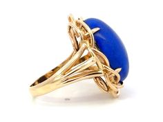 Ring Specifications:Metal: 14k Yellow GoldTotal Weight: 11.0 GramsGemstone: Lapis LazuliLapis Lazuli Measurements: ~20.4 mm x 15 mm x 7.1 mmRing Size: 6.25 (resizable)Stamped: "14K"Condition: Preowned, excellent100% Authentic. Please ask all questions before bidding or making a best offer. International Bidders please contact us before bidding for shipping availability and charges. Blue 14k Gold Oval Cabochon Rings, 14k Gold Blue Oval Cabochon Rings, Oval Blue Opal Ring In 14k Gold, Elegant Blue Oval Cabochon Signet Ring, Oval Blue Signet Ring In 14k Gold, Oval Dome Ring With Gemstone In 14k Gold, Blue Opal Ring In 14k Gold For Formal Occasions, Blue Oval Dome Ring For Formal Occasions, Blue Oval Dome Ring For Formal Events