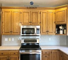 an empty kitchen with wooden cabinets and stainless steel stove top oven in the center area