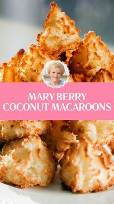 mary berry's coconut macaroons on a white plate with pink border overlay