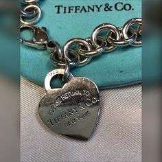 Tiffany Rtt Heart Tag Bracelet 925 Euc Get Your Bracelet, The Classic Heart Rtt Bracelet Is Ready To Be With A New Owner. Pre-Loved, But In Great Condition. Reasonable Offers Welcomed, But May Not Include Tiffany Box And/Or Pouch Depending On Offer. Luxury Sterling Silver Heart Bracelet For Gift, Luxury Silver Bracelets For Valentine's Day, Classic Sterling Silver Bracelet With Charms, Luxury Sterling Silver Bracelets For Valentine's Day, Luxury Sterling Silver Heart Bracelet For Anniversary, Elegant White Gold Charm Bracelet For Valentine's Day, Silver Bracelets For Valentine's Day Formal Occasion, Silver Bracelets For Valentine's Day Formal Event, Luxury White Gold Heart Bracelet