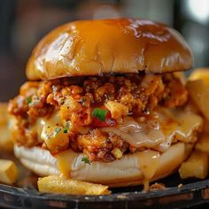 a cheeseburger on a plate with french fries