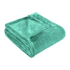 a green towel folded on top of each other