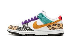 The Women’s Nike Dunk Low “Animal” is a women’s release of the popular sneaker in a colorway that combines multiple animal patterns and textures on its design.  From Nike’s Spring 2022 release cycle, the “Animal” Dunk Low is one of the most eclectic looks of the shoe to release yet.  The toe cap and heel are designed in cheetah print while a panel near the collar above the side Swoosh is detailed in faux-pony-hair in teal on the left shoe and purple on the right.  Nike’s classic Safari pattern i Womens Dunk Low, Wmns Dunk Low, Safari Pattern, Gymnastics Shoes, Sneak Attack, Womens Basketball Shoes, Colorful Heels, Popular Sneakers, Nike Brand