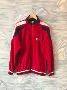 "Vintage Red PUMA Jacket Velvet Jogging Jacket Hipster Running Parka Retro Puma Sport Coat Unisex Soft Jacket Size Small Estimated size: S Materila: 100% Polyester Measurements: (lying flat) Length - 29,5\" / 75 cm Pit to pit: 22.5\" / 57 cm Hips: 17,5\" / 45 cm Sleeve from the neck line: 29\" / 74 cm *Measurements taken while garment lay flat, to get girth you need to double Please check measurements to insure a proper fit. Remember to allow yourself some extra room for movement. You can compar Red Sportswear Windbreaker For Winter, Sporty Red Windbreaker For Winter, Red Winter Sportswear Windbreaker, Sporty Red Fleece Jacket For Fall, Vintage Red Track Jacket For Outdoor, Red Track Jacket For Outdoor Winter Activities, Winter Red Sportswear Track Jacket, Sporty Red Track Jacket For Winter, Sporty Red Long Sleeve Fleece Jacket