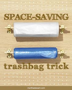 two rolls of trash sitting next to each other on top of a wooden sign that says space saving trashbag trick