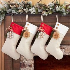 three christmas stockings hanging from a mantel