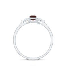 Product Details The Garnet Solitaire Ring features an Octagon Cut Garnet as Solitaire embellished in Prong Setting with Round Shape Diamond gemstones as Trio embellished in Prong Setting, especially for you. Product Information SKU SHP-RINGS122043968 Width 3.5 mm Height 6.1 mm Weight 1.60 gm (Approximate) GARNET INFORMATION No.of Stones 1 Pieces Total Weight 0.70 Carat (Approximate) Dimension(approx) Emerald Cut-4X6 mm-1 Pcs Color Red Cut Brilliant Shape Emerald Cut Setting Type Prong-Setting Quality Grade AAA DIAMOND INFORMATION No.of Stones 6 Pieces Total Weight 0.29 Carat (Approximate) Dimension(approx) Round-2X2 mm-6 Pcs Color HI Cut Brilliant Shape Round Setting Type Prong-Setting Quality Grade SI View More Product Parent Collection Handle garnet-rings Octagon Shape, Ring With Diamond, 18k Yellow Gold Ring, Ring Sizer, Garnet Rings, Diamond Gemstone, Yellow Gold Rings, Solitaire Ring, Emerald Cut