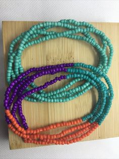 This handmade waist beads set is handcrafted with quality glass seed beads and includes two matching the color is very bright and transparent. African Waist Beads set, can be used as a necklace, bracelet, anklet, according to your different dresses to meet your different needs.   These handmade waist beads are made of glass seed beads.  The circumference of the waist bead is about 31.49 inch (80 cm) without stretch. They can be used in many ways such as with low-waist trousers on, beach and pool Colorful Multi-strand Beaded Bracelets For Beach, Beach Multi-strand Colorful Beaded Bracelets, Colorful Oval Beads Bracelets For Beach, Colorful Oval Beads Bracelet For Beach, Oval Tiny Beads Bracelets For Beach, Colorful Oval Beaded Bracelets For Beach, Beach Beaded Bracelets With Large Oval Beads, Beach Beaded Bracelets With Tiny Oval Beads, Green Waist Beads For Beach