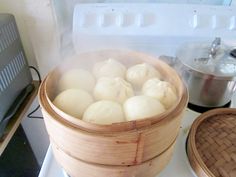 some food is being cooked in a pot on top of the stove and ready to be eaten