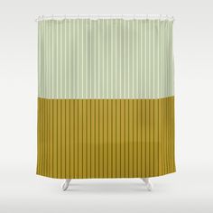 a shower curtain with yellow and green stripes