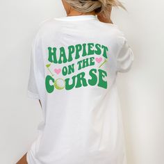 Looking for a cute golf gift? So glad our adorable happiest on the course golf tshirt for women caught your eye! These make the perfect gift for your favorite golfer (or for yourself, of course!)  SIZING: These are unisex shirts and run slightly larger/longer for women. Please review the size guide in listing photos for specific sizing information. To achieve the oversized look pictured, size up 1-2 depending on the look you're going for; again, please reference the size chart in the listing pho Golf Shirts Women, Golf Shirt Women, Golfer Gifts, Golf Tshirt, Cute Golf, Tshirt For Women, Golf Gift, Gifts For Golfers, Golf T Shirts