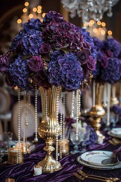 purple and gold centerpieces are on the table