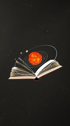 an open book sitting on top of a table next to a red object in the sky