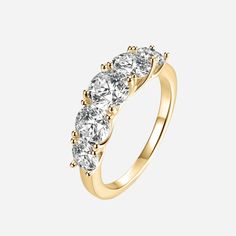 three stone diamond ring in yellow gold with four stones on each side and two diamonds at the top