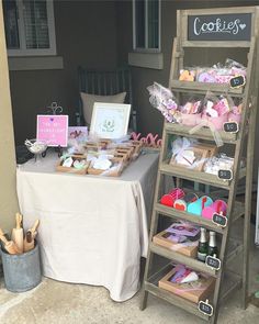 a table that has some items on it and is set up for someone's bridal party