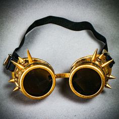 This Black Steampunk Goggles With Spikes Is A Great Costume Accessory Or Cosplay Dress Up For Halloween Party, Music Festival, Ball, Wedding, And Any Cosplay Event Specifically Designed With The Trendy Steampunk Style For Luxury And Mysterious Look Unique Eye-Catching Costume Goggles Helping You Stand Out In The Party The Item Is Carefully Handmade With Durable High-Quality Material To Provide Comfortable Long Hours Of Wearing @Usm-G1006-Bkgo Gold Steampunk Costume Accessories For Festival, Gold Steampunk Costume Accessories For Parties, Gold Steampunk Costume Accessories For Costume Party, Steampunk Gold Costume Accessories For Cosplay, Gold Steampunk Costume Accessories For Cosplay, Steampunk Costume Accessories For Cosplay In Gold, Gothic Gold Costume Accessories For Festival, Steampunk Adjustable Masks And Prosthetics For Festivals, Adjustable Steampunk Masks And Prosthetics For Festival