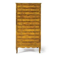 an old chest of drawers with many drawers on each side and one drawer in the middle