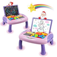 two children's toy laptops sitting on top of each other