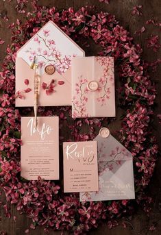 the wedding stationery was done in pink and gold, with an elegant floral theme