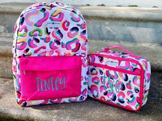 "These bags are so much fun and full of vibrant colors! They have a pocket on each side and a pocket on the inside! The book bag is 11\" L X 5.5\" W X 16\" H and the lunch box is 10\" L X 3\" W X 7.5\" H *Please note that we can only add INITIALS to the lunchboxes. Please make sure to include the following on the checkout page: 1. Monogrammed name (including capitalization) or Initials... please make sure to put in order that you would like stitched on the item If you have questions, please feel Fun Bags For End Of School Year Events, Fun Multicolor School Bags, Fun Multicolor Bags For School Events, Multicolor Bags For Daycare And Back To School, Fun Bags For Back To School, Customizable Multicolor Bag For Back To School, Customizable Multicolor Back-to-school Bag, School Spirit Rectangular School Bag, Rectangular School Spirit Bag For School