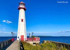 Gorgeous lighthouse and pier at Chief Wawatam Park in St Ignace Light Houses