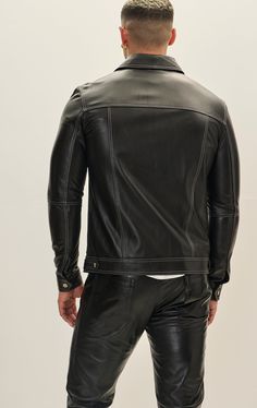 Crafted from premium leather, this jacket boasts durability and a luxurious feel. The leather is typically sourced from high-quality hides, ensuring a supple texture and robust performance. The stitching is often reinforced for longevity, emphasizing both style and functionality. SIZE + FITTailored fit, to find your correct size use the ''what's my size '' button. COMPOSITION 100% Lambskin LeatherMade in TurkeyStyle #: 71479CARESpecialist Leather Clean Only Suits For Sale, Sneaker Dress Shoes, Leather Shirt, Cardigan Vest, Leather Vest, My Size, Wool Suit, Boots And Sneakers, Jogger Jeans