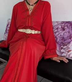 Premium quality handmade silk crepe red Moroccan kaftan. The black belt is included. Important Note: Stainless steel gold belts are not included. Please contact us for more information. This caftan is ideal for family occasions such as family celebrations, the month of Ramadan, Eid, or weddings. Several sizes available. It is also possible to personalize your caftan according to your taste, contact us for more information. Top quality kaftan, handy made. The black belt is included This caftan is ideal for family occasions such as family celebrations, the month of Ramadan, aid, or weddings. Several sizes available, it is possible to have it in Matchi-Matchi version: mom/daughter. It is also possible to customize your caftan according to your taste, contact us for more information Red Traditional Drape Kaftan For Party, Elegant Red Long Sleeve Abaya, Elegant Long Sleeve Red Abaya, Luxury Wedding Abaya, Elegant Red Kaftan With Traditional Drape, Elegant Red V-neck Kaftan, Elegant Red Abaya For Festive Occasions, Elegant Formal Kaftan With Traditional Drape, Elegant Festive Kaftan For Traditional Ceremonies