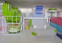 several plastic containers are stacked on top of each other