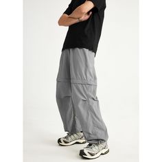 Detachable Waterproof Wide Leg Gray Casual Pants Fabric: 100% Nylon Size: S, M, L, XL Multiple Color Selections: Gray  Season: Spring, Fall, Summer Gray Techwear Pants For Outdoor Activities, Techwear Gray Bottoms For Outdoor Activities, Baggy Gray Pants For Outdoor, Gray Parachute Pants With Cargo Pockets For Outdoor, Casual Cargo Pants With Zip Fly For Outdoor, Casual Waterproof Hiking Pants, Functional Baggy Pants For Outdoor, Casual Waterproof Parachute Pants For Outdoor, Waterproof Casual Parachute Pants For Outdoor