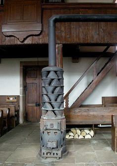 the inside of a church with pews and benches