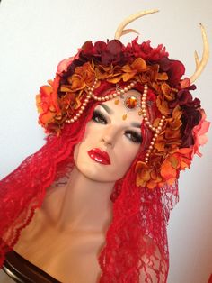 Day of the dead floral bridal Fantasy headdress headpiece wig antlers orange red fall autumn.  via Etsy. Fantasy Headdress, Phoenix Costume, Red Spider Lily, Floral Headdress, Recycled Dress, Witch Makeup, Red Fall, Fantasy Hair, Hair Shows