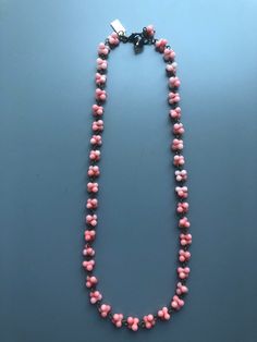 "This necklace was handmade using pink coral peanut beads, approx 6, 8, 9 and 10mm and antique brass eye pins. It measures approximately 27 cm / 10.6 inches in length, and approximately 16 cm / 6.3 inches diameter. Please check your neck measurements before buying, the necklace could be extended  if needed. The necklace is secured with an antique brass lobster clasp. I only use antique brass findings, nickel free. I love the vintage feel they give to my jewellery. This piece is finished with a personalised brass oval charm and a smoked quartz faceted bead. My jewellery is packed carefully inside jewellery boxes with my name on it.  Some photos are close ups, therefore showing the items a lot bigger than in reality, so that you can check the detail. Colors can differ due to the use of flash Coral Necklaces With Faceted Round Beads, Coral Necklace With Faceted Round Beads, Vintage Coral Beaded Necklaces In Red Coral, Vintage Coral Beaded Necklaces, Large Pink Beads For Jewelry Making, Vintage Coral Beaded Necklace In Red Coral, Coral Beaded Necklaces With Faceted Beads, Pink Vintage Beaded Necklaces With Colorful Beads, Coral Faceted Beads For Jewelry Making