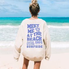 Meet me at the beach in our retro coconut girl sweatshirt. It is a trendy oversized crewneck sweatshirt and is sure to be a favorite. It's comfortable, warm, and soft. This beachy aesthetic sweatshirt has a minimalist look that goes with almost everything, whether you are just lounging around at home or out and about, get in that beach state of mind. ♥ Our unisex heavy blend crewneck sweatshirt is pure comfort. These garments are made from polyester and cotton. This combination helps designs com Trendy Letter Print Sweatshirt For Beach, Oversized Trendy Sweatshirt For Beach Season, Trendy Oversized Sweatshirt For Beach Season, Summer Vacation Hoodie With Crew Neck, Letter Print Sweatshirt For Beach Vacation, Vsco Letter Print Sweatshirt For Beach, Relaxed Fit Graphic Print Beach Hoodie, Oversized Hoodie For Beach Season Streetwear, Oversized Sweatshirt For Beach Vacation