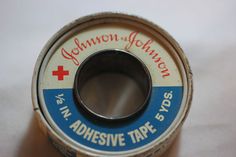 an adhesive tape with the words johnson & johnson on it and a red cross logo