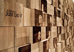 the wall is made up of wooden blocks with pictures on them that say,'a few who just did it '