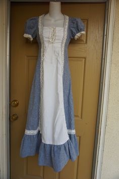 "Black label Gunne Sax prairie dress. Zips in the back and laces in the front of bust. Labeled size 7 but fits more like 3 -please see measurements. Condition is absolutely great with no flaws to note!! Measurements taken across front laid flat 16\" across front armpit to armpit 13\" across front of waist (ties tighter) 51\" length" India Dress, Overlay Dress, Gunne Sax, Prairie Dress, Lace Maxi, Lace Maxi Dress, Black Label, Long Maxi Dress, Long Sleeve Maxi Dress