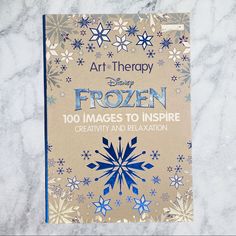 the front cover of a book with snowflakes on it