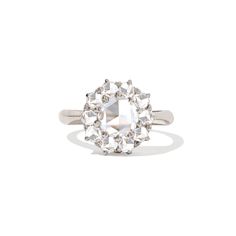 Item Details: One natural rose cut center diamond weighing approx. 0.70-0.80 ctw, F/G color VS2 clarity. Ten natural old mine cut diamonds weighing 1.00 ctw, F/G color VS clarity. The band is 2mm wide and half round. White Platinum Diamond Ring With Rose Cut, White Platinum Cluster Ring With Single Cut Diamonds, White Cluster Ring With Diamond Cut Lab Grown Diamonds, White Cluster Ring With Lab Grown Diamond Cut, Dazzling Platinum Diamond Ring With Rose Cut Diamonds, Vintage White Cluster Ring With Rose Cut Diamonds, White Diamond Ring With Rose Cut, Timeless Octagon Rose Cut Diamond Ring, Timeless Lab-grown Diamond Ring With Rose Cut Diamonds