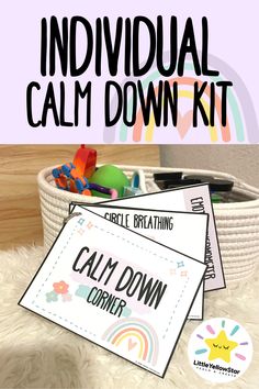 the individual calm down kit is sitting on top of a white rug with toys in it