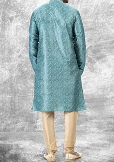 Ready-Made Kurta, With Churidar Pajama. Embroidery, Pintux, and Jacquard Art Silk kurta. Dupion Ready Made Churidar Pajama. Crafted in Chinese Collar Neck, and Full Sleeve. High-Quality Matching Buttons. Please Note: The footwear shown in the picture is for presentation and photography purposes only. Color: There might be slight color variation due to lighting and flashes while the photo shooting. The color may also vary because of different screen resolutions. Wash Care: Dry Clean Only. Art Silk Churidar For Eid Festive Occasion, Festive Blue Sherwani For Puja, Brocade Salwar Kameez With Intricate Embroidery For Diwali, Eid Brocade Unstitched Suit With Chikankari Embroidery, Festival Brocade Salwar Kameez With Chikankari Embroidery, Eid Chikankari Embroidery Unstitched Brocade Suit, Blue Churidar For Diwali Puja, Bollywood Style Semi-stitched Brocade Churidar, Brocade Salwar Kameez With Chikankari Embroidery For Diwali