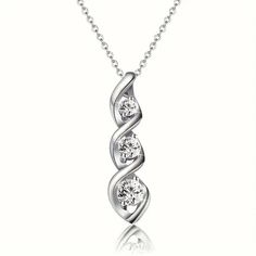 Brand New Women's Twisted White Gold Spiral Diamond Necklace 14k White Gold Plated Sterling Silver Genuine 2ct Lab Created Radiant Cut Diamonds Measurements: Length - Adjustable From 16" To 18" Pendant Size 1.35" X .4" Retail Price $300 Buy With Confidence From A Trusted Seller With A 99%+ Feedback Rating! *Also Available In Yellow Gold A0199 (Id-1413-) Spiral Cubic Zirconia Jewelry For Anniversary, White Gold Spiral Jewelry For Formal Occasions, Formal Spiral White Gold Jewelry, Formal White Gold Spiral Jewelry, Silver Three Stone Necklace In Fine Jewelry Style, Silver Three Stone Necklace, Fine Jewelry Style, Spiral Brilliant Cut Jewelry For Anniversary, Spiral Jewelry With Brilliant Cut For Anniversary, Fine Jewelry Silver Necklace With Three Stones